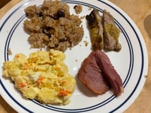 A simple version of a Panamanian Christmas Eve dinner.  

From top left: raisin rice, roast pork, ham, potato salad with apples.  I was feeling ever so slightly hungry and if I reheated them I could post them here.  In hindsight this was a lot of carbs and pork to eat so late at night.  