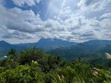 This mountain is known as the “shy” mountain, as it’s typically hidden by clouds.