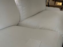 White couches are patched up