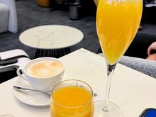 Coffee, OJ, and Bucks Fizz, ordered via the QR code on the table. This system worked well.