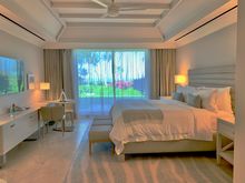 the bedroom of our 1BR Oceanfront Suite