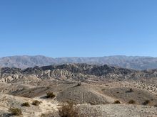 San Andreas fault in the foreground and Joshua Tree NP behind it 