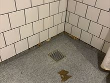 Shower worn to subfloor