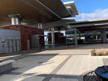 Out the front to a courtyard with the skybridge to the terminal to the left. 