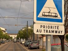 Trams run down the middle of the street in this neighbourhood