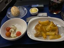 Pre-landing pasta dish, which was overcooked to the point of near in-edibility. Fortunately I was still stuffed from the aforementioned mammoth short rib. 