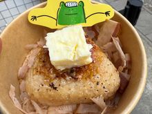 A warm rice ball with a lump of local Hida butter. A tasty savoury snack.