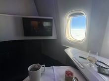 I was really surprised by the size of the table, it is really really small, once the tray is there you can put anything else. Even the purser I got was very surprised by the small size( it was her flight on this cabin)