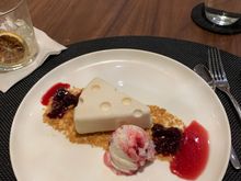 NY cheesecake with ice cream and cherry compote