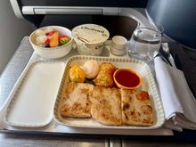 Regular menu dim sum plate SQ705 (BKK-SIN): Oversll not a bad dim sum plate and the chili sauce def helped to add some needed spice. Overall a decent outstation short haul breakfast.