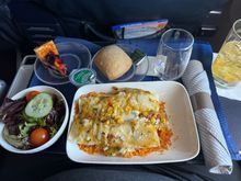 Enchiladas yesterday, EWR-STI. Reasonably tasty, if you keep in mind what they are: basically, a TV dinner. I’m on an airplane, I don’t expect restaurant-quality food. This tasted decent and filled me up. The accompanying salad was fresh, roll was warm, and I agree with others, that blueberry cheesecakey dessert is delicious. 

Also, I had an old-fashioned, but that’s more relevant to another thread. 
