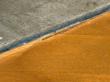 Ugly gap between wood planks in the lounge 