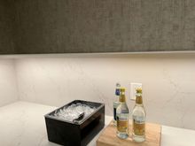 They finally put ice and mixers out! But…without any glassware. 