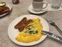 Omelette. My wife mentioned that the pancakes were decent. 