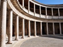 Doric-Tuscan pillars on the lower level, and Ionic columms on the upper level. - The Palace of Charles V. 