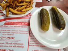 Cole slaw, fries, and sour pickles at Schwartz's Delicatessen