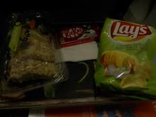 I had forgotten to mention that DS had got a seat near the front of the plane; as a result, unlike us backbenchers, he had managed to snag a vegetarian sandwich