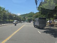 There is a road between both sides of the hotel
