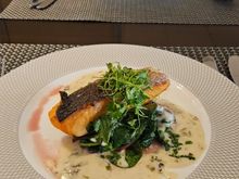 Salmon, seaweed white wine sauce and Spinach.