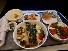 SCL - ATL: Bizarre service all around. Single coursed again and the purser put the meal down on my tray before I had even received any linens and drinks. The other flight attendant wasn't happy at all and was walking around with a grimace. The purser then asked three separate times if I was done while walking around with a full tray of desserts in her hand. She did the same exact thing for breakfast which made me wish I was on the other side of the plane.