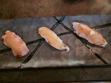 dry aged yellowtail on the left and a mackerel on the right. sorry, don't remember the center