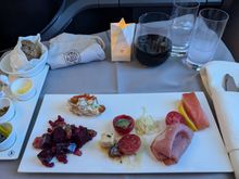 Appetizer selection. I was seated in the last row so I asked for a bit of whatever was left. It was good but I did not find it remarkable. The apps from the 9PM YUL-IST flight on the inbound of this itinerary posted above were better. Probably because they may have run out of the better stuff by the time they got to my row. But absolutely nothing to complain about.