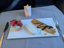 Similar to the appetizer trolley I asked for whatever was recommended from what was left as well as a fruit cup. Everything was good, but not quite as excellent what I consider the TK dessert standard. I was excited for the apricot crepes but they were just okay to my taste. I don't think I would have done better with any of the other options however as I didn't have enough room left for the baklava style pastries nor was I in the mood for tiramisu. Fruit was good but not peak.