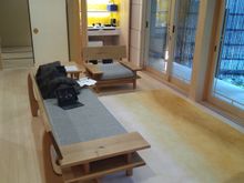 Living room with "mini bar" and garden view to the right.