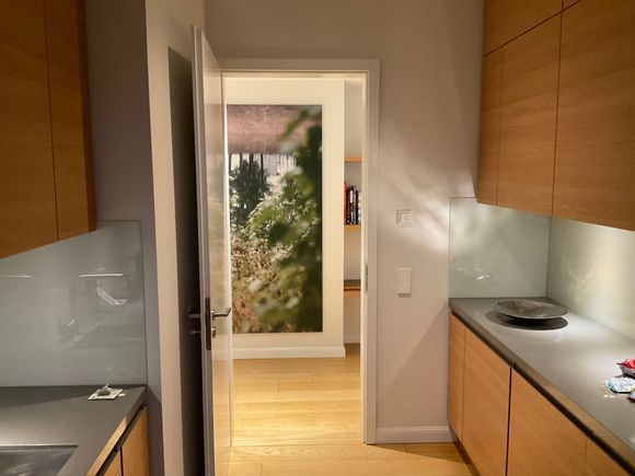 View from kitchen back to rooom corridor