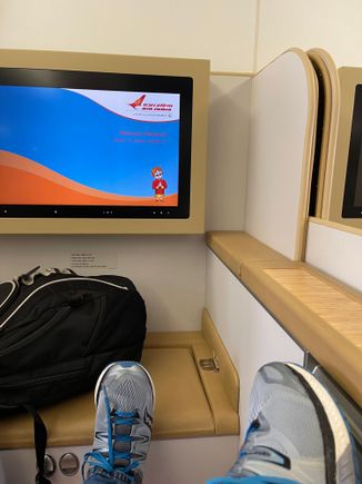 I raised the seat divider and kept it up throughout the flight. 