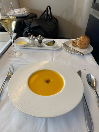 Sweet potato soup, coriander fritter, micro herbs