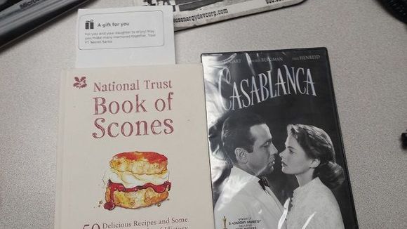 Not sure who this Secret Santa is but thank you so much! Daughter is thrilled with the movie and the cookbook is a perfect addition to my collection. Yummy!