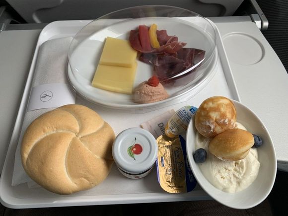 Lufthansa is one of the airlines still providing a proper offering of food and beverage. It’s not the same as usual (no open bar service on the trolley, etc) but this is pretty good for a 50 minute flight. Had a nice fresh cup of coffee, too. Thankfully my return trip to Canada is on Lufthansa.
