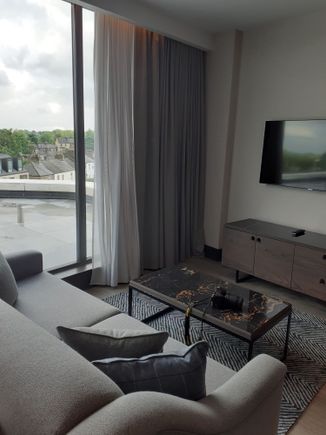 Room 319 Sofa , TV and external view