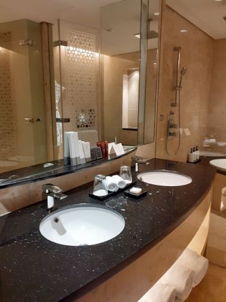 Bathroom sinks. Wet room ( with rainhead shower to right ( you can just see  the shower to the right of the photo)