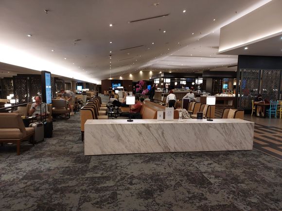Sparsely populated satellite lounge.