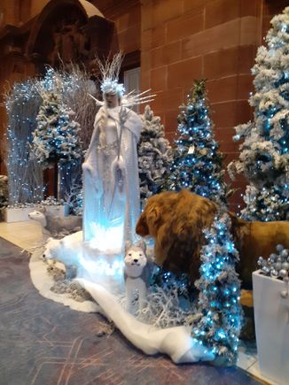 Some of the christmas decorations in Peacock Alley . the lion's head moves from left to right)