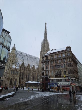 Stephansplatz 10am sunday morning. Snow just covering the tiles on the cathedral roof.