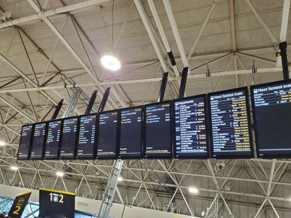 The monitors showing the various current and later departures