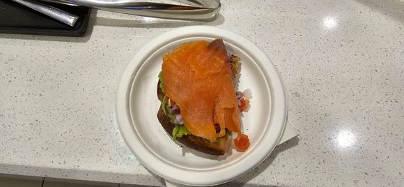 I got an avocado toast before I saw the lox platter across the way from the bar
