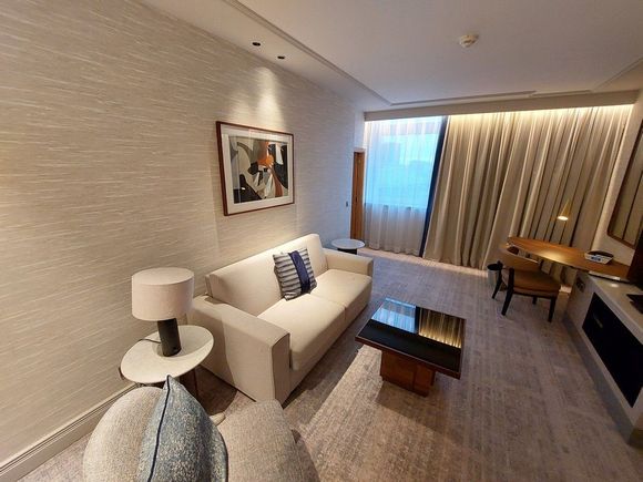 Living Room of a Junior Suite / IC Berlin