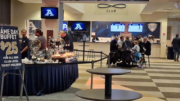 The buffet is complementary if you bought a club seat ticket. Face value is $150, but I got mine for significantly less.