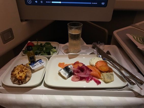 Appetizer: Cold smoked salmon, baltic herring, mustard herring, vendace roe and cream, roasted carrots, marinated onions, green salad with lemon olive oil, and Karelian pies. Very good.