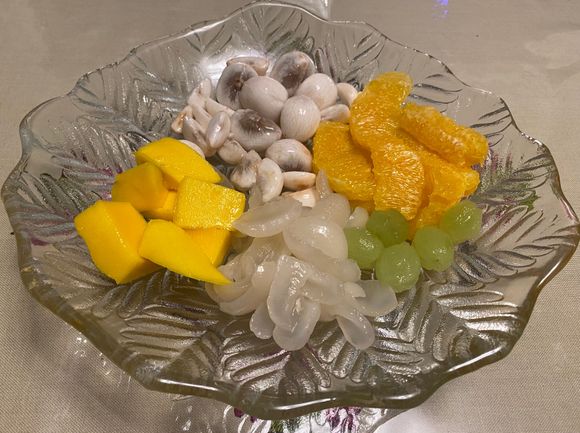 Mango , mangosteen, orange , grapes and rambutans