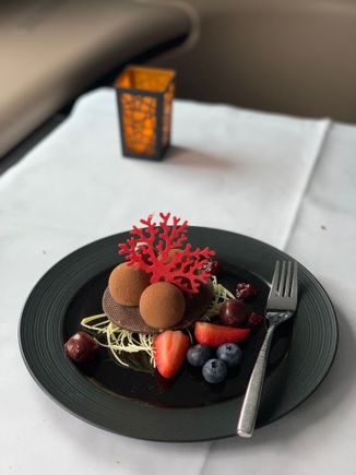 Deconstructed Black Forest. Pretty to look at but all the components seem rather stand alone. Would’ve been better if accompanied by a raspberry coulis. 