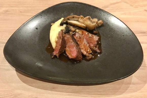 Rib eye steak with mushrooms and truffle mash