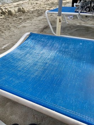 Example of disrepair at the pool side on chairs, adding to overall sense the place is not well kept