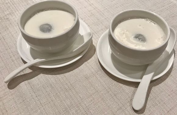 Almond cream with black sesame “ balls “