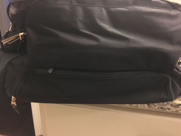 
Pic of the shoe/wet umbrella compartment on the bottom of the bag (on the back side).