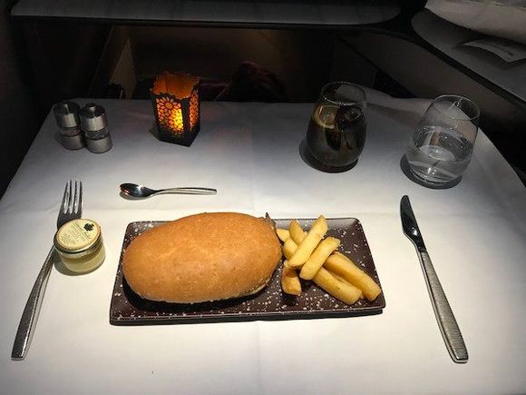 Beef steak with Cheddar and onion chutney in black olive ciabatta bread
